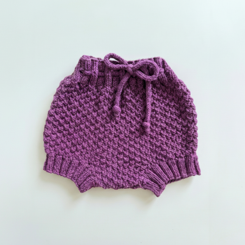 Purple knitted baby bloomers on a light background | Vili Bear NZ